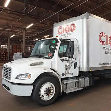 Ciao Moving & Storage truck in a commercial warehouse